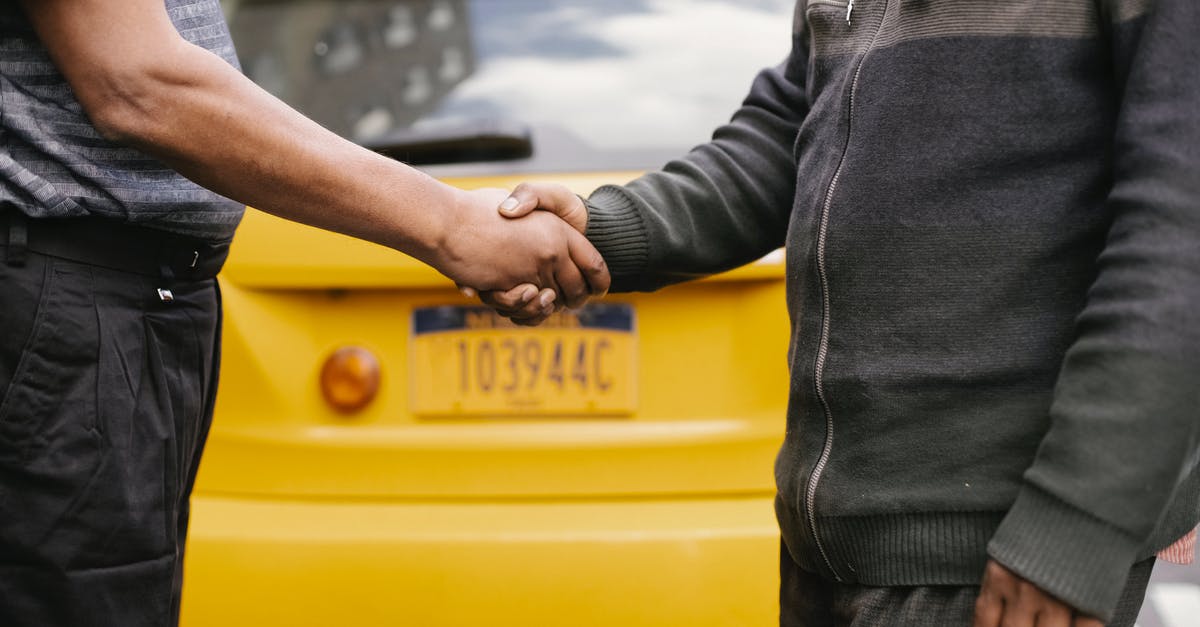 How to achieve reentry with bigger crafts? - Side view of crop ethnic anonymous males shaking hands while meeting each other on street