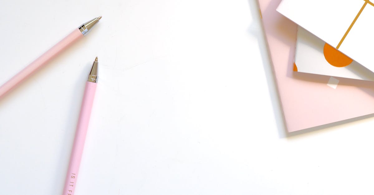 How to create a closed redstone circuit on a timer? - Two Pink Ballpoint Pens on Table