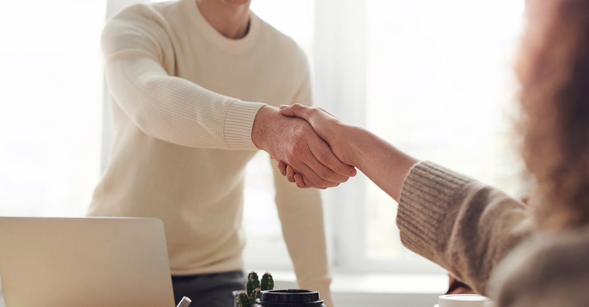 How to deal with lack of a certain resource? - Man and Woman Near Table