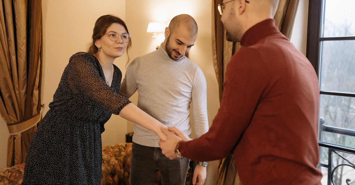 How to deal with Turtle's shield - A Man Shaking Hands with a Woman Standing Beside His Husband