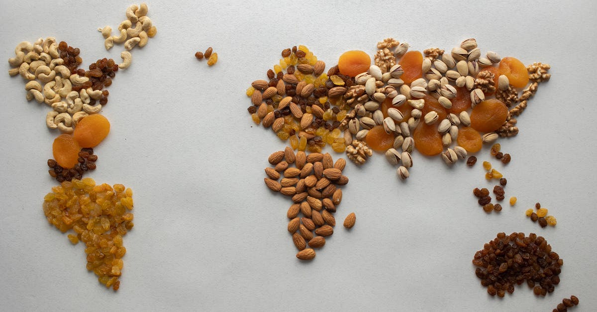 How to do testfor with different maps - Top view of creative world continents made of various nuts and assorted dried fruits on white background in light room