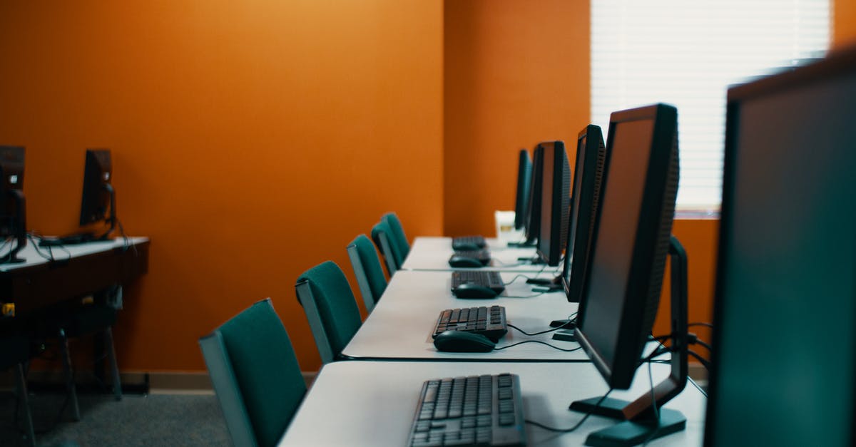 How to get mouse to confine to the game on dual monitor setup on Mac? - Modern computers with keyboards and mice placed in row on table with chairs in contemporary workplace with orange walls How to get mouse to confine to the game on dual monitor setup on Mac? - Modern computers with keyboards and mice placed in row on table with chairs in contemporary workplace with orange walls