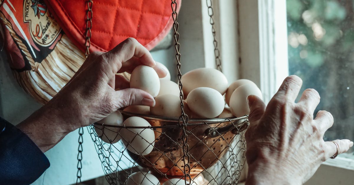 How to get Tallbird Eggs without getting shredded to pieces? - A Person Getting an Egg from the Stainless Basket