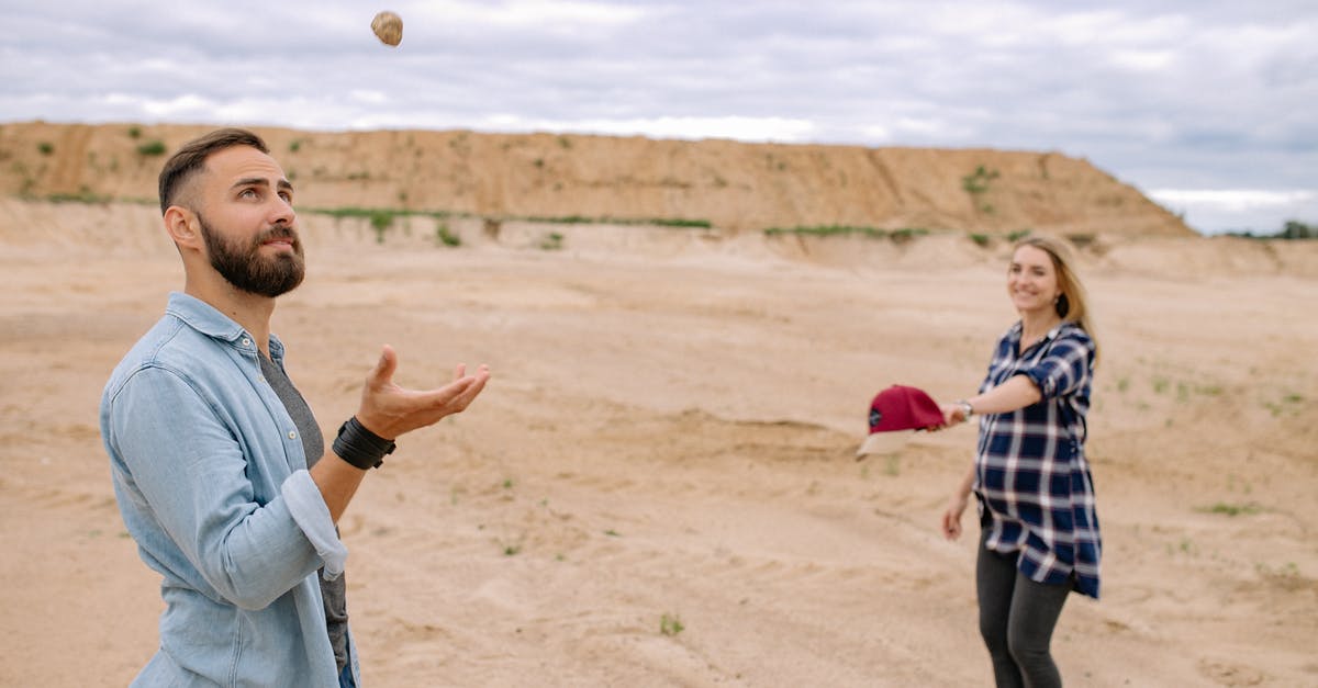 How to have the least hassle beating a Butterfree? - Smiling Man and Woman in Desert Having Fun