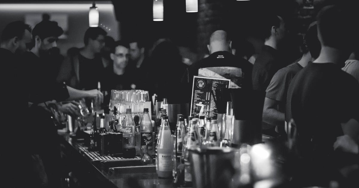 How to Leave Link Club Room - Grayscale Photography of Bottles on Top of Table