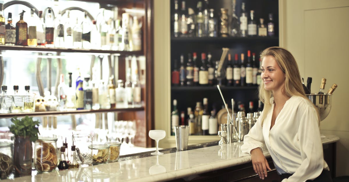 How to Leave Link Club Room - Woman in White Long Sleeve Leaning In Counter Table