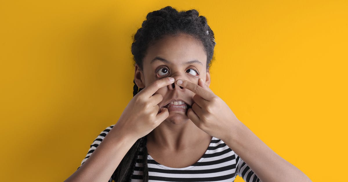 How to make voices louder in Black Mesa? - Young funny African American woman grimacing in studio