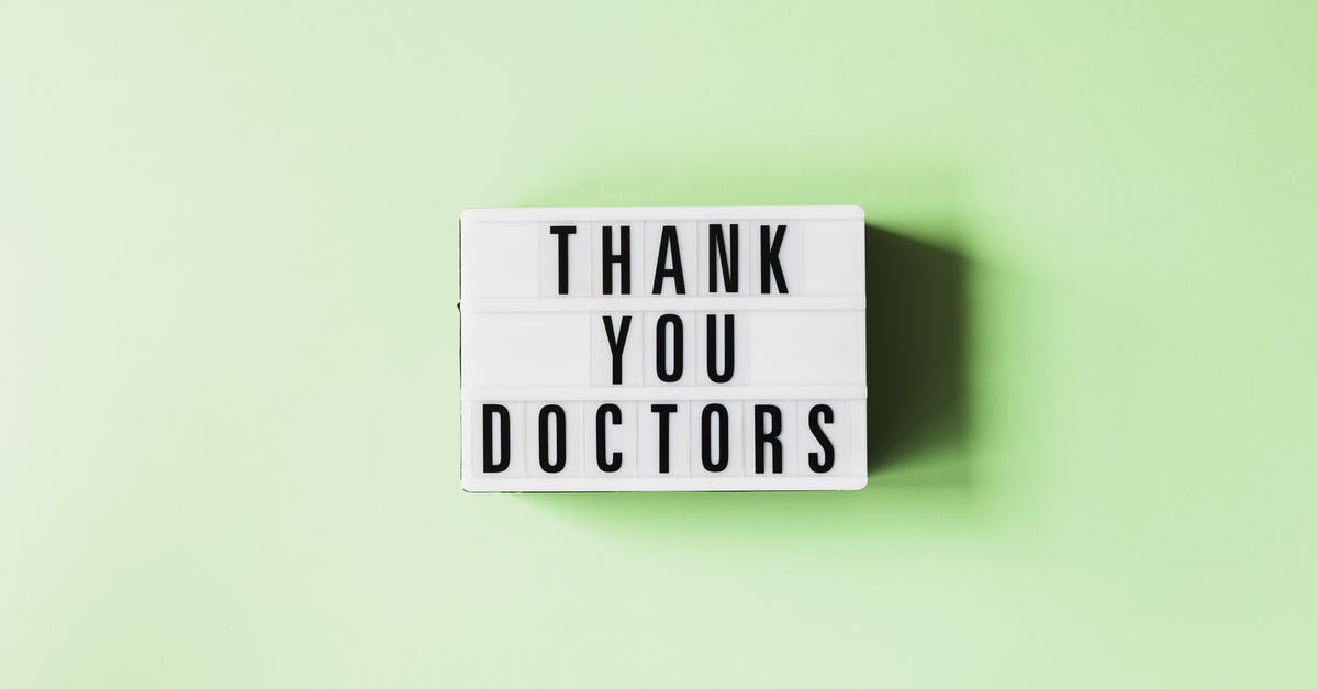 How to prevent others from changing a structure in Minecraft? - Top view of retro light box with THANK YOU DOCTORS inscription placed on green surface