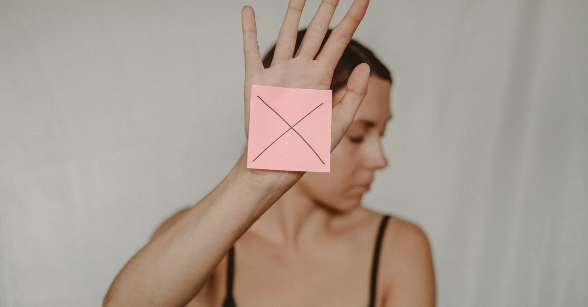 How to protect against poison in ES Blades? - Woman with paper with cross sign