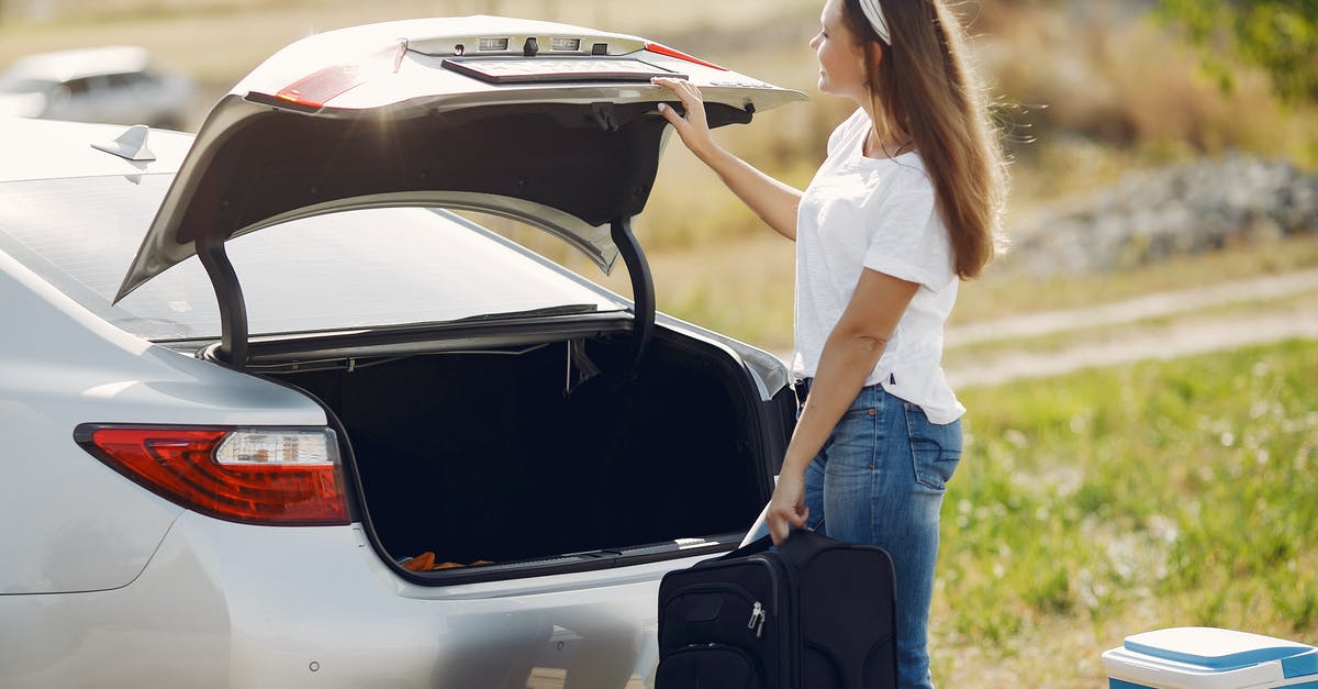 How to put everyone except myself into adventure mode? [duplicate] - Side view of cheerful female traveler in headband and casual clothes putting luggage in open trunk of modern car while spending summer weekend in countryside