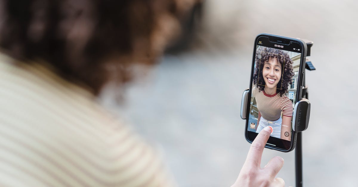 How to record Vanilla Minecraft in higher FPS than the screen? - Crop cheerful young ethnic female vlogger touching screen on cellphone while preparing for video record in town How to record Vanilla Minecraft in higher FPS than the screen? - Crop cheerful young ethnic female vlogger touching screen on cellphone while preparing for video record in town