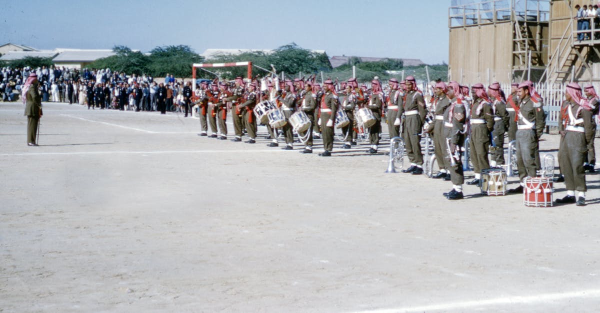 How to recover from losing soldiers - People Standing on Gray Concrete Floor