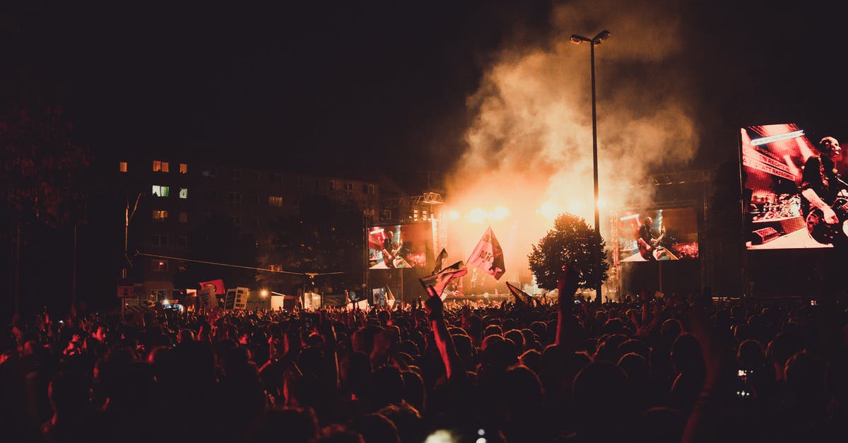 How to show ping and fps on screen - Band Performing on Smoky Stage in Front of People during Night Time