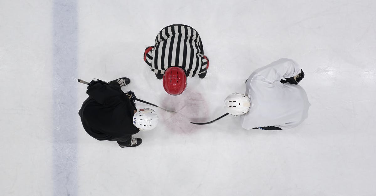 How to start a new match offline - A Referee and Hockey Players on an Ice Rink