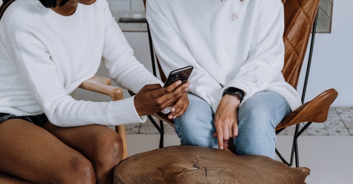 I can't log onto my friends server - Woman in White Long Sleeve Shirt and Blue Denim Shorts Sitting on Chair