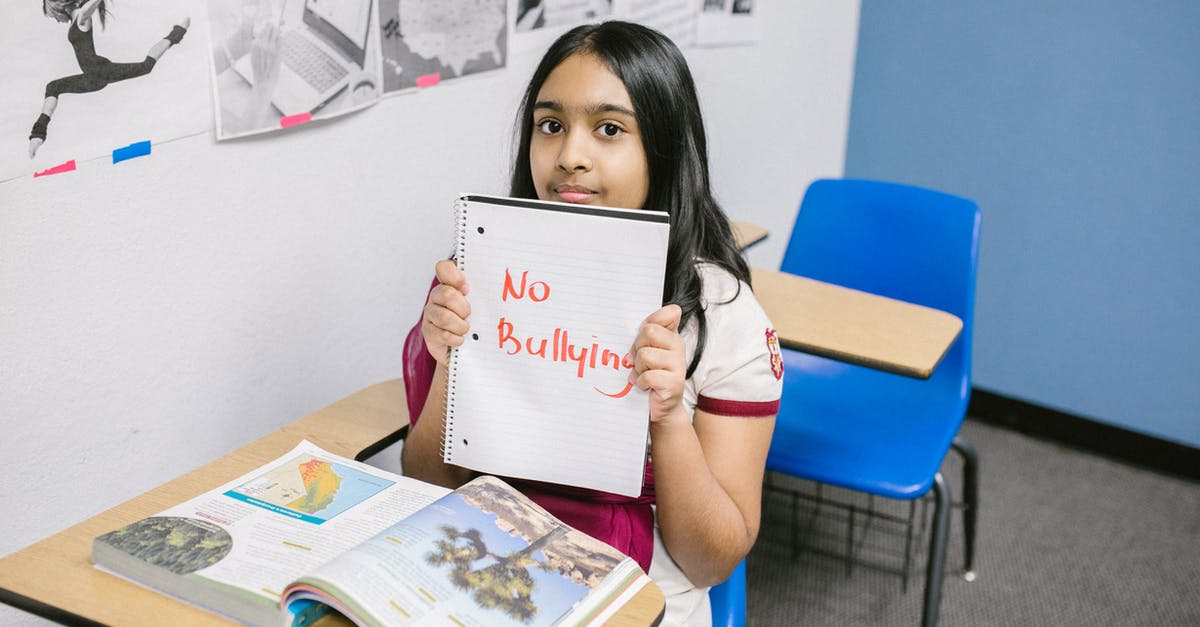 I cannot annex Indian state, only "force migration" - Girl Showing a Message Written in a Notebook