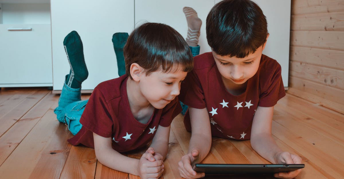 I cannot use Shift+W+1 at the same time - Cute siblings using tablet together at home