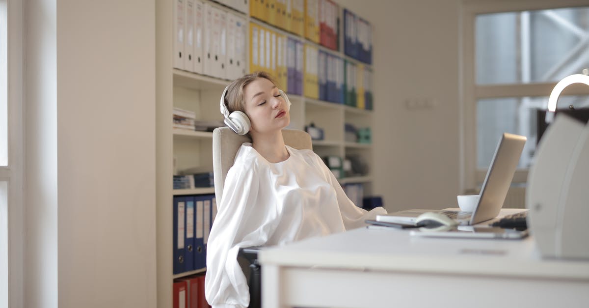 I finished Weyworld but where is Hubworld? - Woman in White Dress Shirt Sitting on Chair