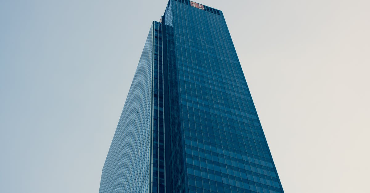 I somehow glitched into New Donk City`s Tallest building - Low Angle Photography of Curtain Building Under White Sky