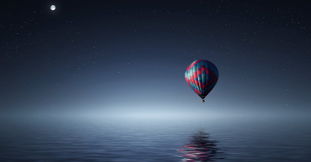 If I encounter a travelling pokémon, is it gone forever? - Red and Blue Hot Air Balloon Floating on Air on Body of Water during Night Time