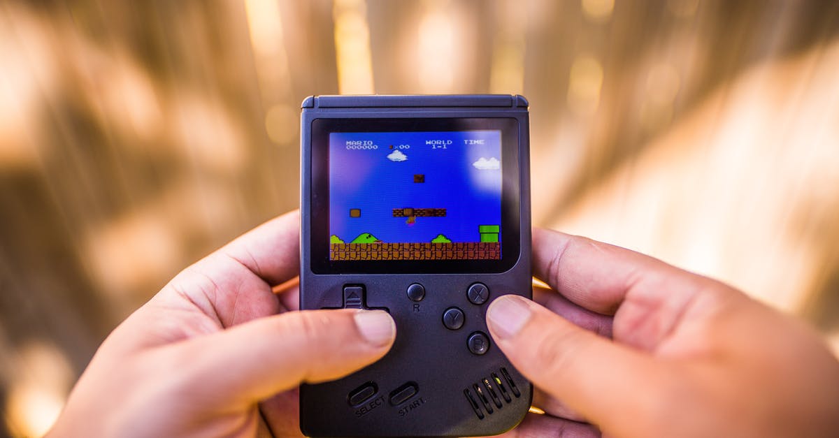 Illustrated list of differences between the arcade and NES versions of Super Mario Bros - Shallow Focus Photo of Gameboy Console Illustrated list of differences between the arcade and NES versions of Super Mario Bros - Shallow Focus Photo of Gameboy Console