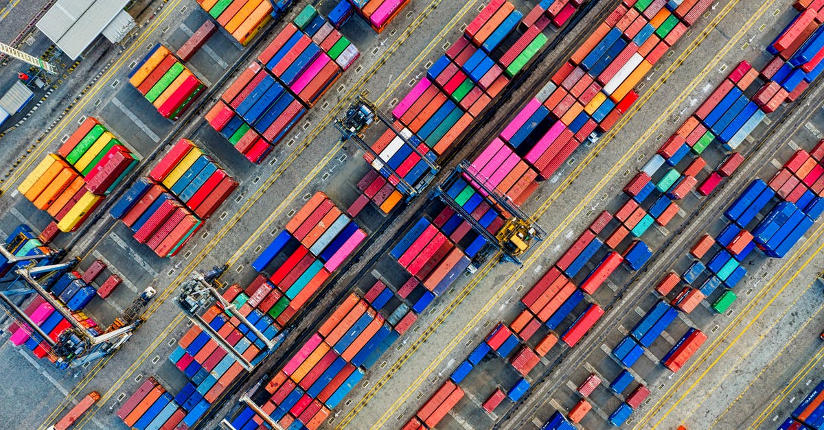 Import dropping for no particular reason - Aerial Photography of Container Van Lot