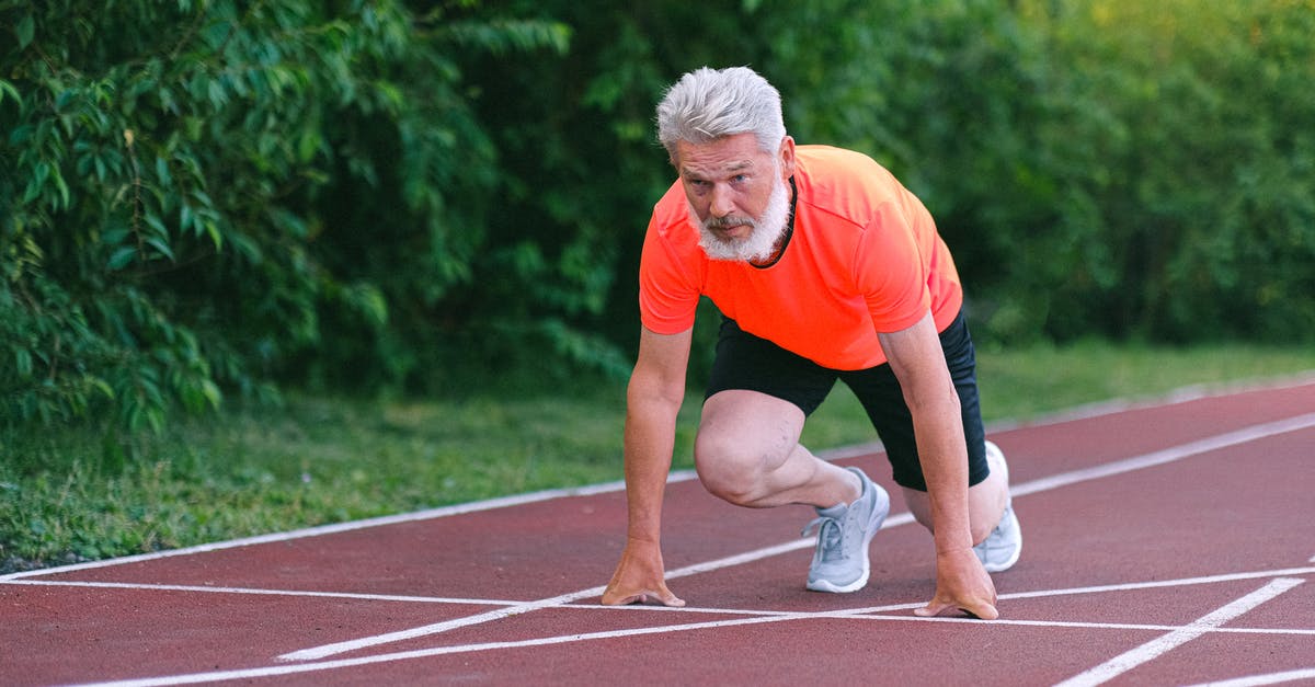 In what levels is the Green Demon Challenge possible? - Serious strong elderly man starting for run in racetrack