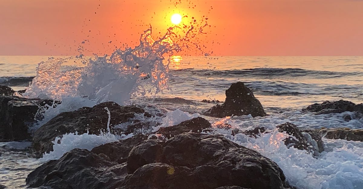 Invert Y-Axis Water Spray in Super Mario Sunshine - Rocky Shore during Sunset With Ocean Waves