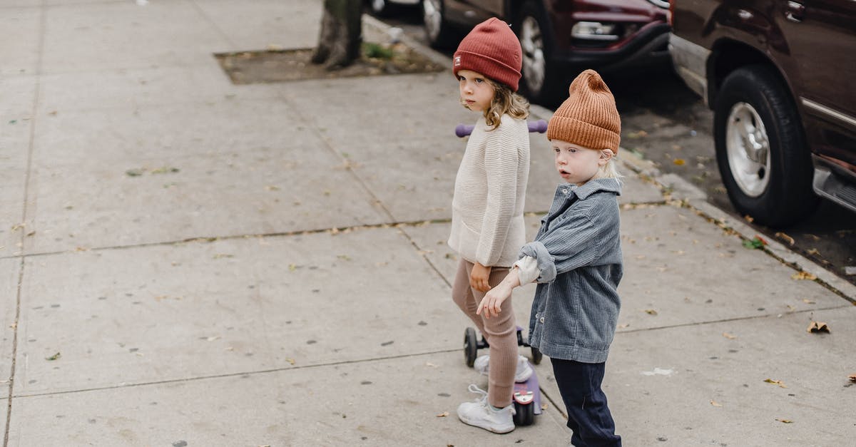 Is getting kicked in CS:GO a way to avoid win/lose? - Stylish siblings standing on sidewalk