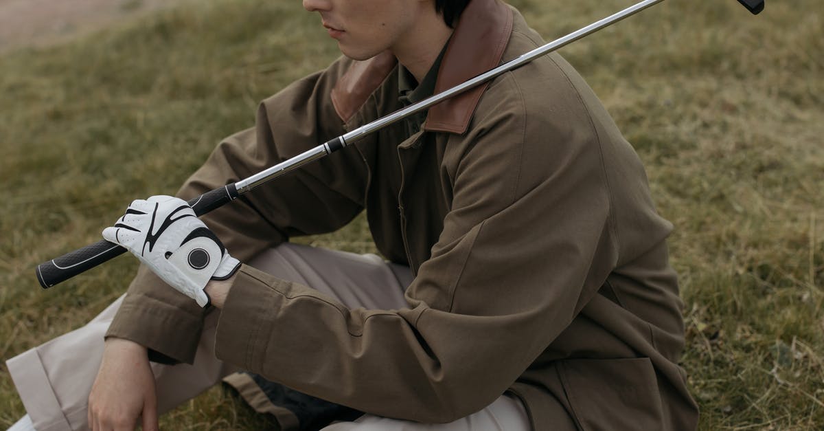 Is it possible to make a Player go only backwards? - Man Sitting on a Grass while Holding Golf Club