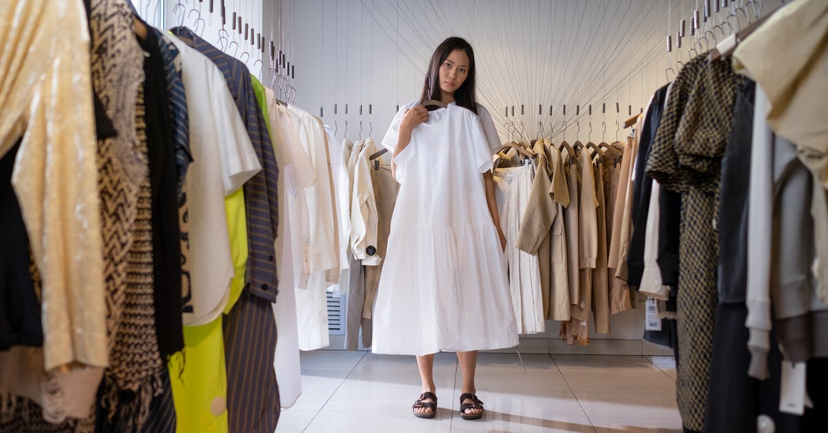 Is it possible to store a hydra somewhere? - Woman in White Long Sleeve Dress Standing on White Floor Tiles