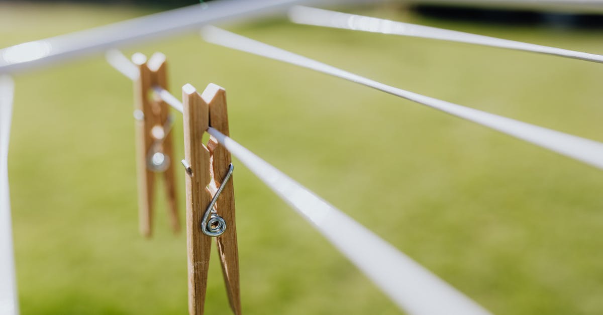 Is the Fallout series all set in the same timeframe? - Composition of wooden clothespins hanging on collapsible clotheshorse placed on green lawn in garden on sunny day