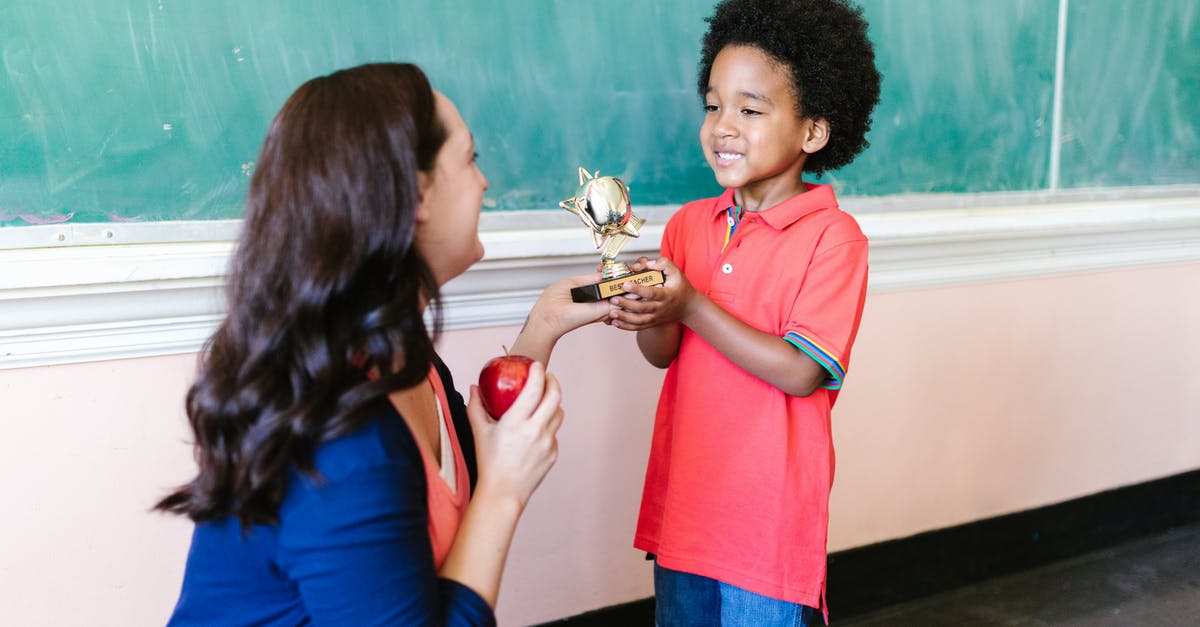 Is the Groovitron trophy tracked across playthroughs? - Little Boy in Red Polo Shirt Holding Gold Trophy