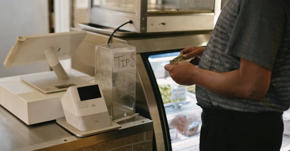 Is there a good counter to wedge + biggs combo? - Unrecognizable male in casual clothes standing with money near cash register in grocery store while making purchase near glass showcase