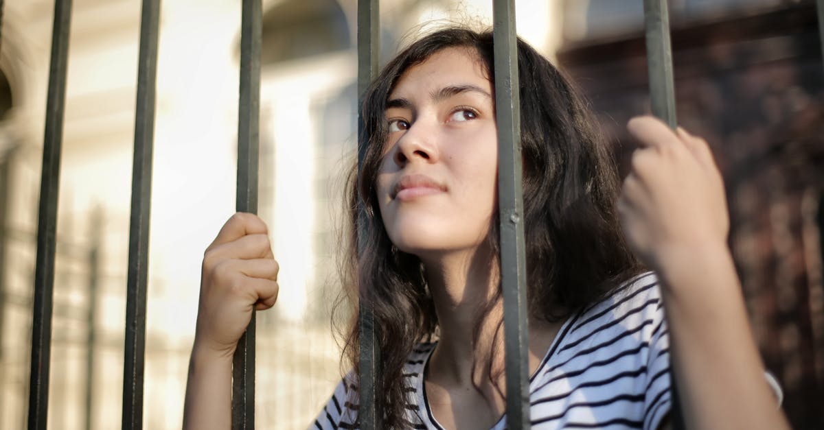 Is there a limit on the amount of Greater Rift Floors? - Sad isolated young woman looking away through fence with hope Is there a limit on the amount of Greater Rift Floors? - Sad isolated young woman looking away through fence with hope