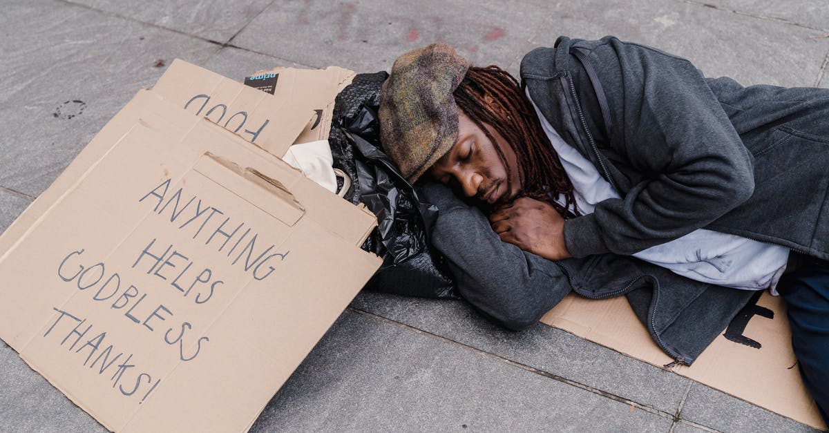 Is there a population cap for cities in SC4? - Man in Gray Hoodie Lying on Gray Concrete Floor