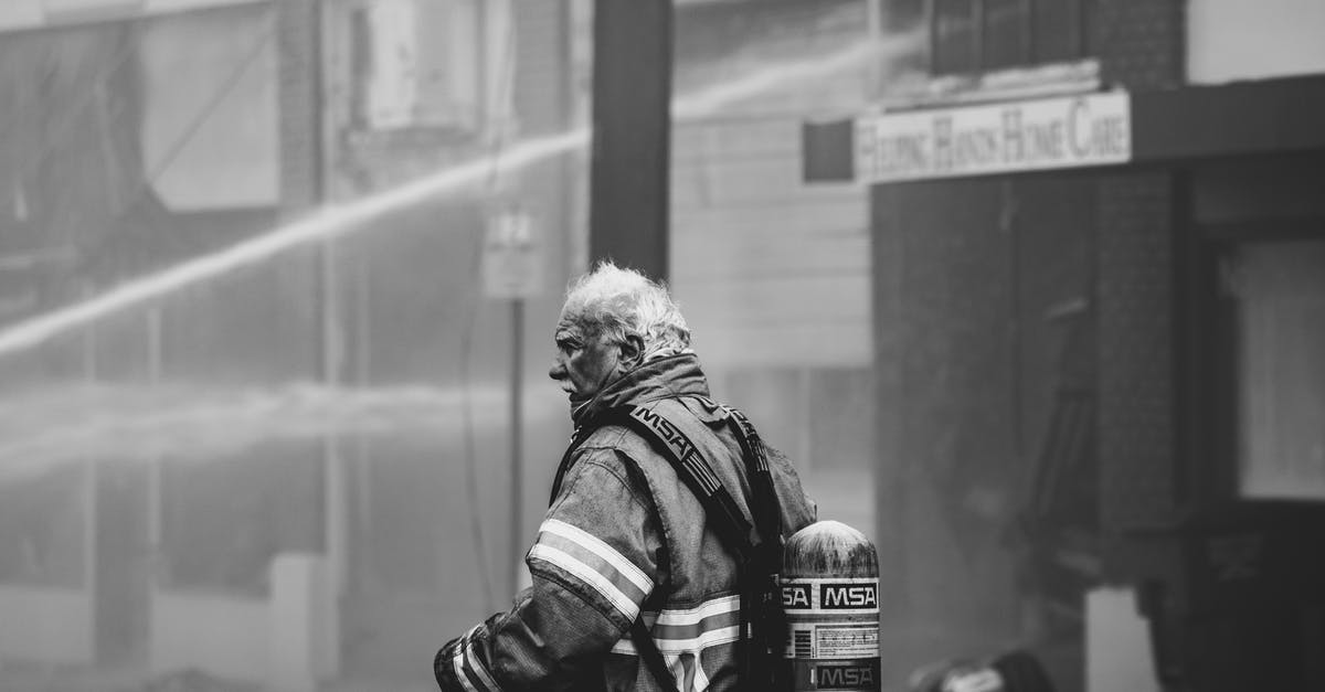 Is there a reward for building a colony on a more dangerous planet? - Grayscale Photo of Firefighter