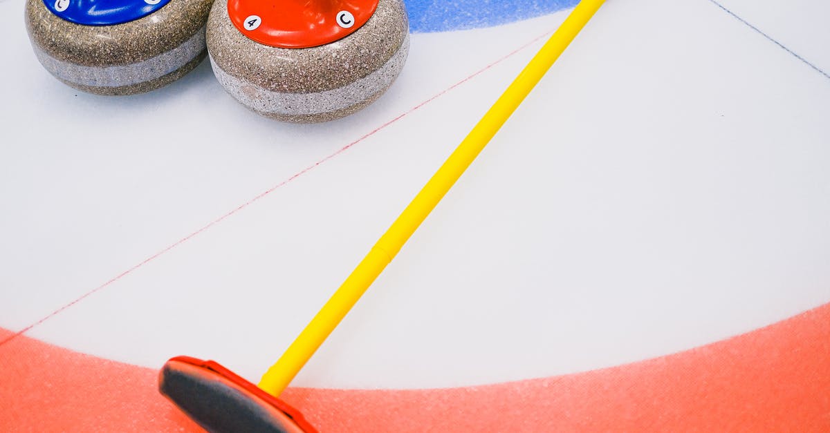 Is there a share code for this Aim Arena/Sniper's Alley custom game? - From above of granite curling stone and broom placed on ice sheet in house with colorful target area in playing area