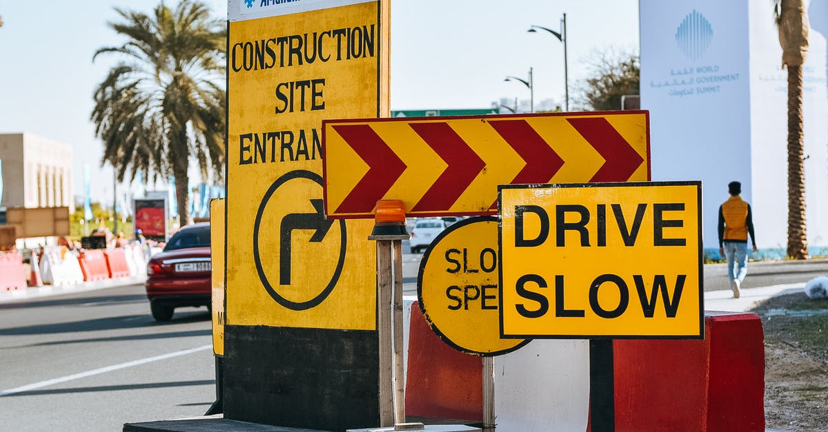 Is there a way to access the worms across the dig site on Ginger Island? - Contemporary city road on sunny day with various traffic signs warning about driving slow because of construction site entrance Is there a way to access the worms across the dig site on Ginger Island? - Contemporary city road on sunny day with various traffic signs warning about driving slow because of construction site entrance