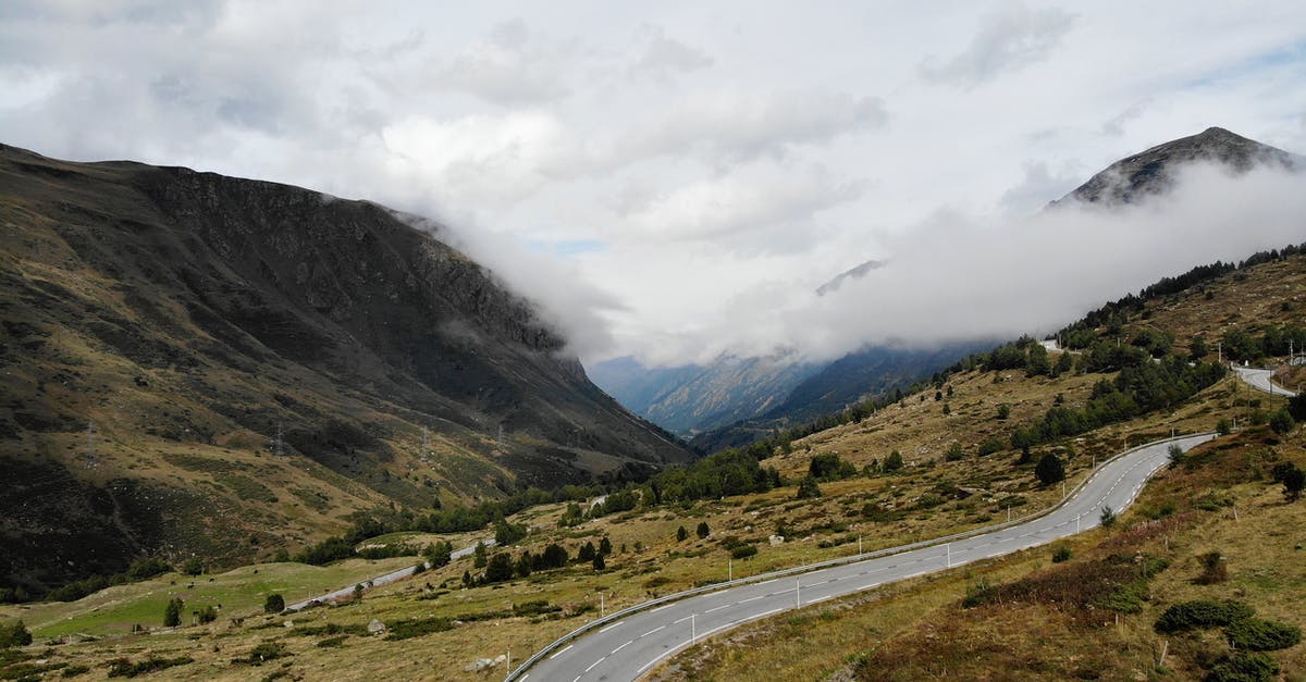 Is there a way to prevent wild Pokémon from running away in battle? - Scenic landscape of road in mountainous valley against misty sky Is there a way to prevent wild Pokémon from running away in battle? - Scenic landscape of road in mountainous valley against misty sky