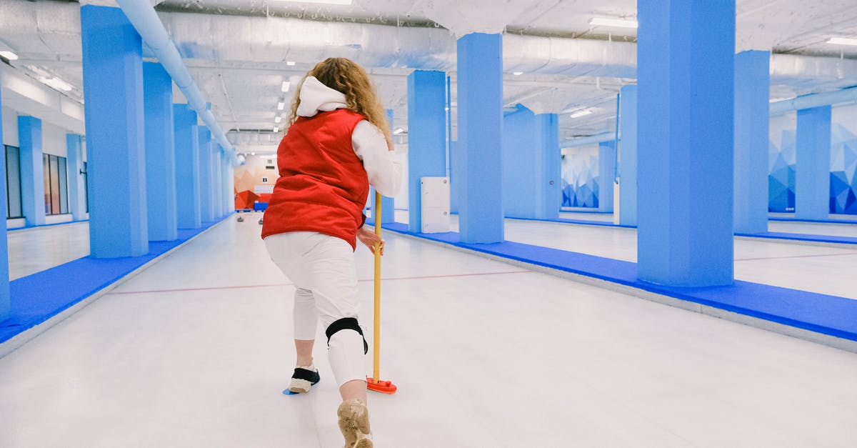 Is there any use to the slide bounce/kick move? - Active woman playing curling on ice rink