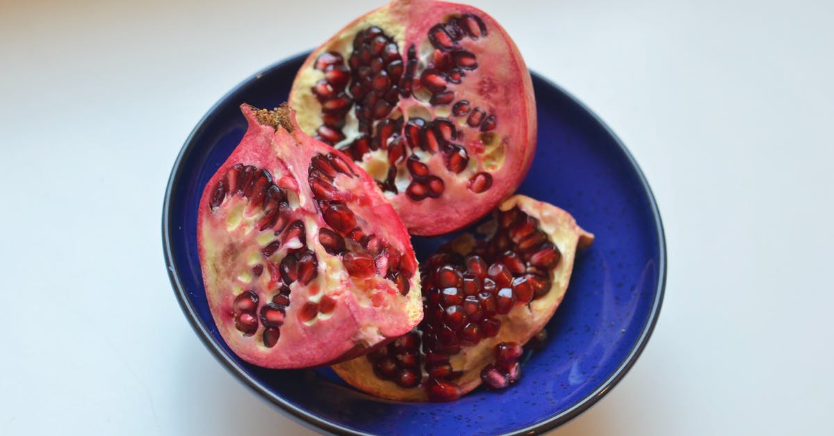 Is there any way, at all in any possible situation, to transfer Pokémon from Pokémon Red or Blue to Pokémon Ruby, Sapphire, or Emerald? - Cut red pomegranate served in bowl