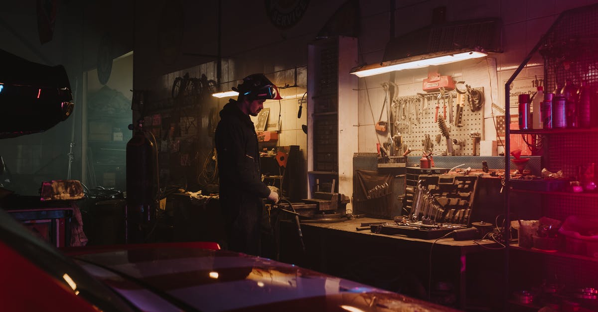 Is there way to fix save files? - Man in Black Jacket Standing Near Table