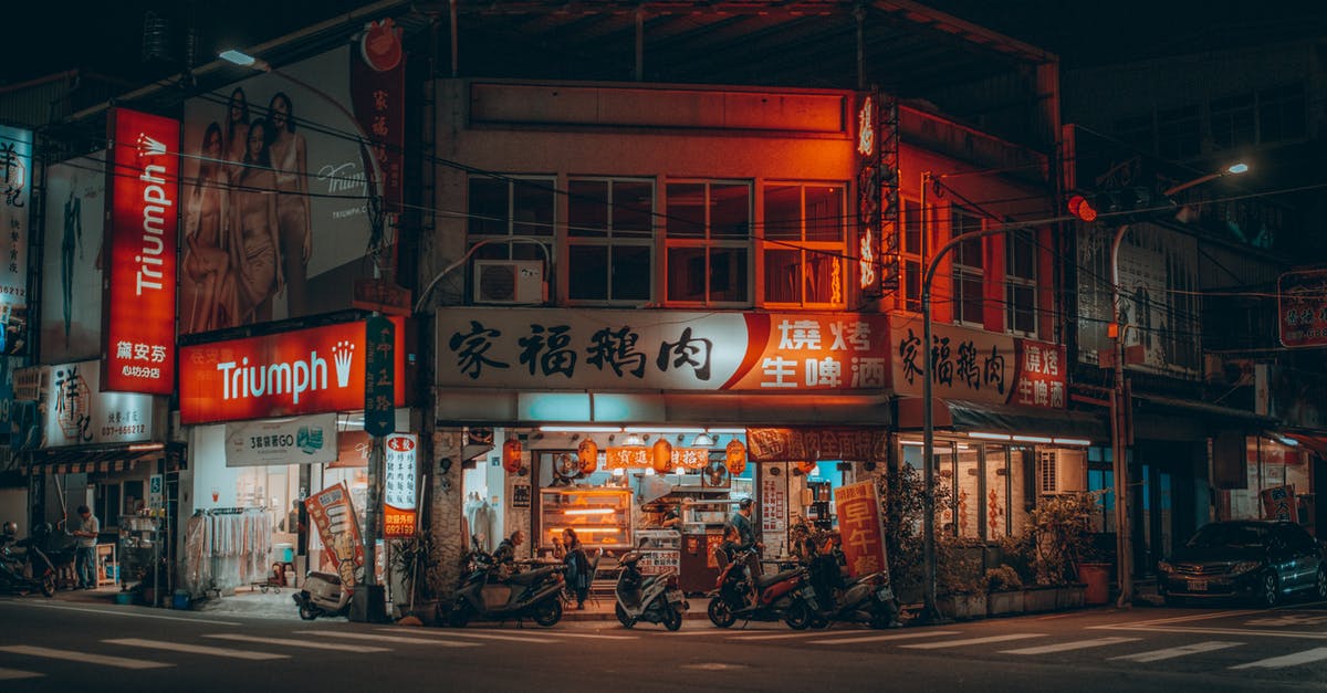 JSON Errors in Custom Signs - People Walking on Sidewalk Near Store during Night Time