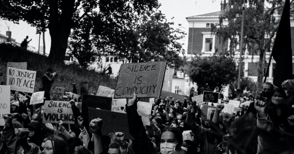 JSON Errors in Custom Signs - Black and White Photo of People Protesting in Street