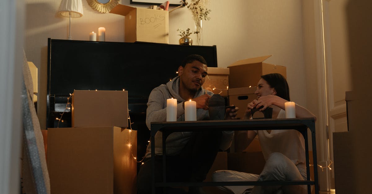 Light boxes troubles - Man in White Long Sleeve Shirt Sitting on Chair