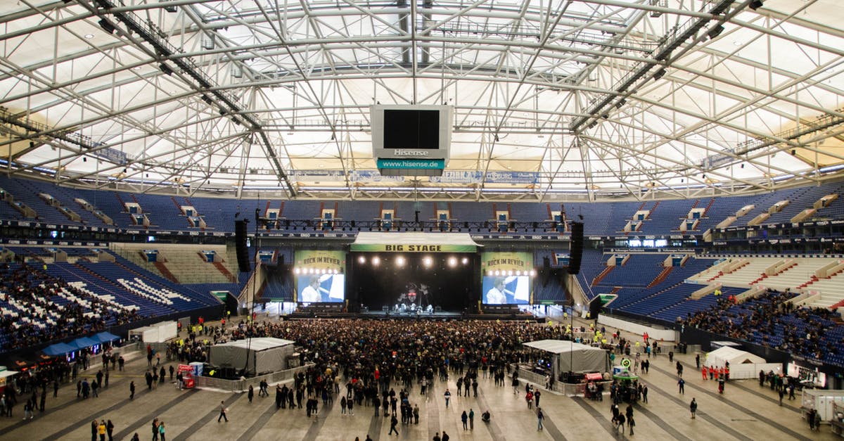 Magic: The Gathering Arena - How to switch basic land art? - Crowded People Standing Watching Live during Daytime