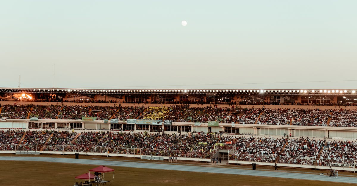 Magic: The Gathering Arena - How to switch basic land art? - Photo Of Stadium During Dawn 