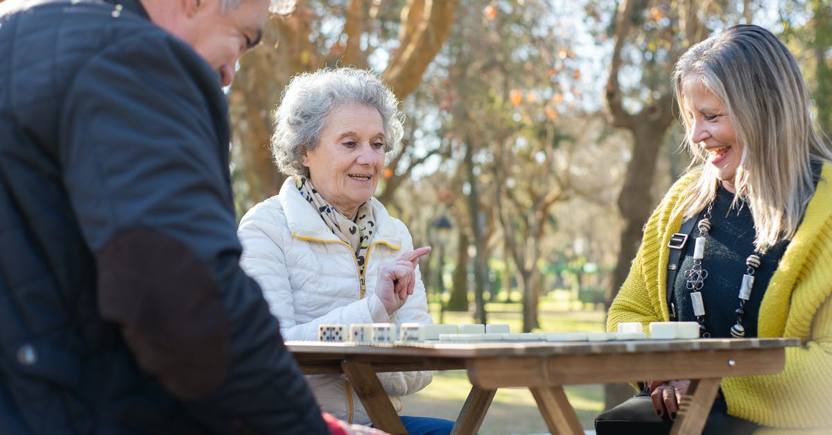 Mid to Late Game Doldrums - Elderly People Playing Dominoes