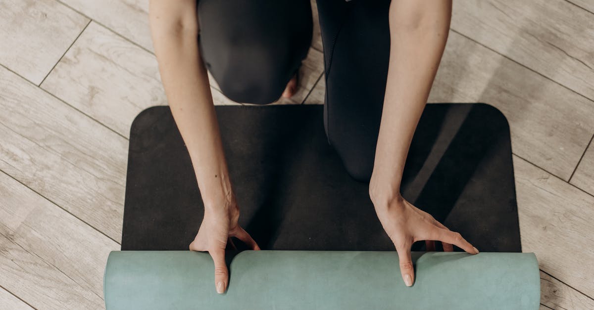 Mind worm spam at endgame - Woman in Black Leggings Unrolling A Yoga Mat